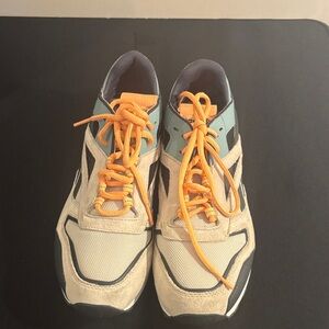 Stylish Sneakers with Orange Laces